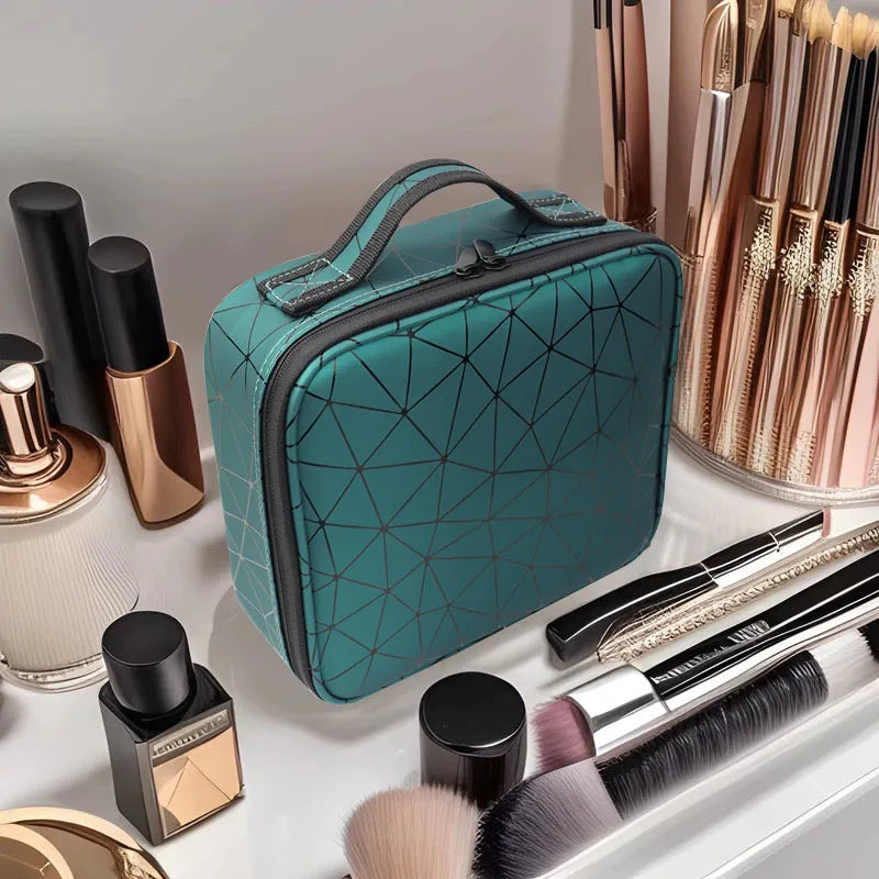 Teal geometric makeup bag by Elarose on vanity with brushes, cosmetics, and skincare items