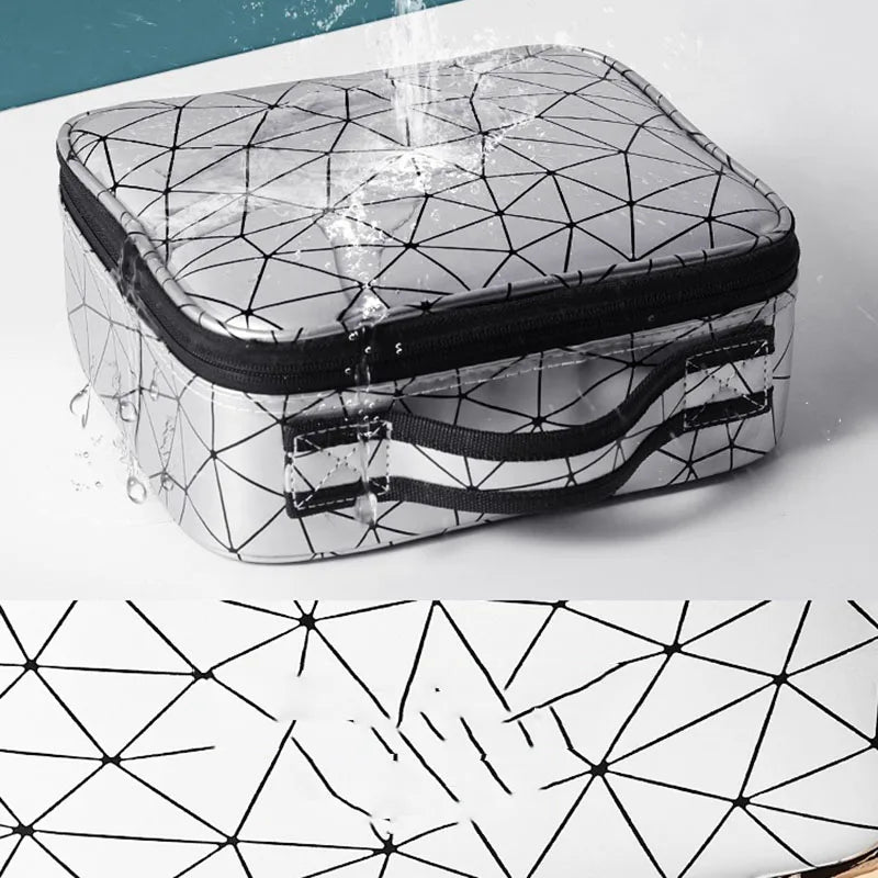 Waterproof geometric pattern travel case with handle by Elarose on white surface